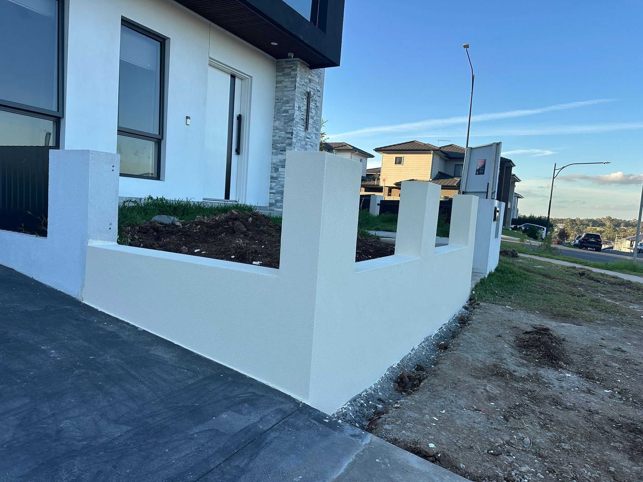 Rendered Planter Walls - New Estate