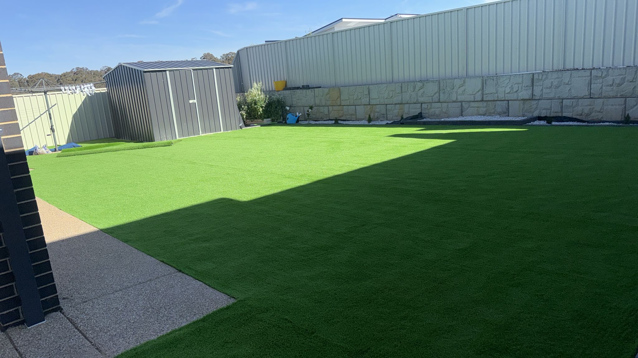 Synthetic Turf & Retaining Wall - Backyard