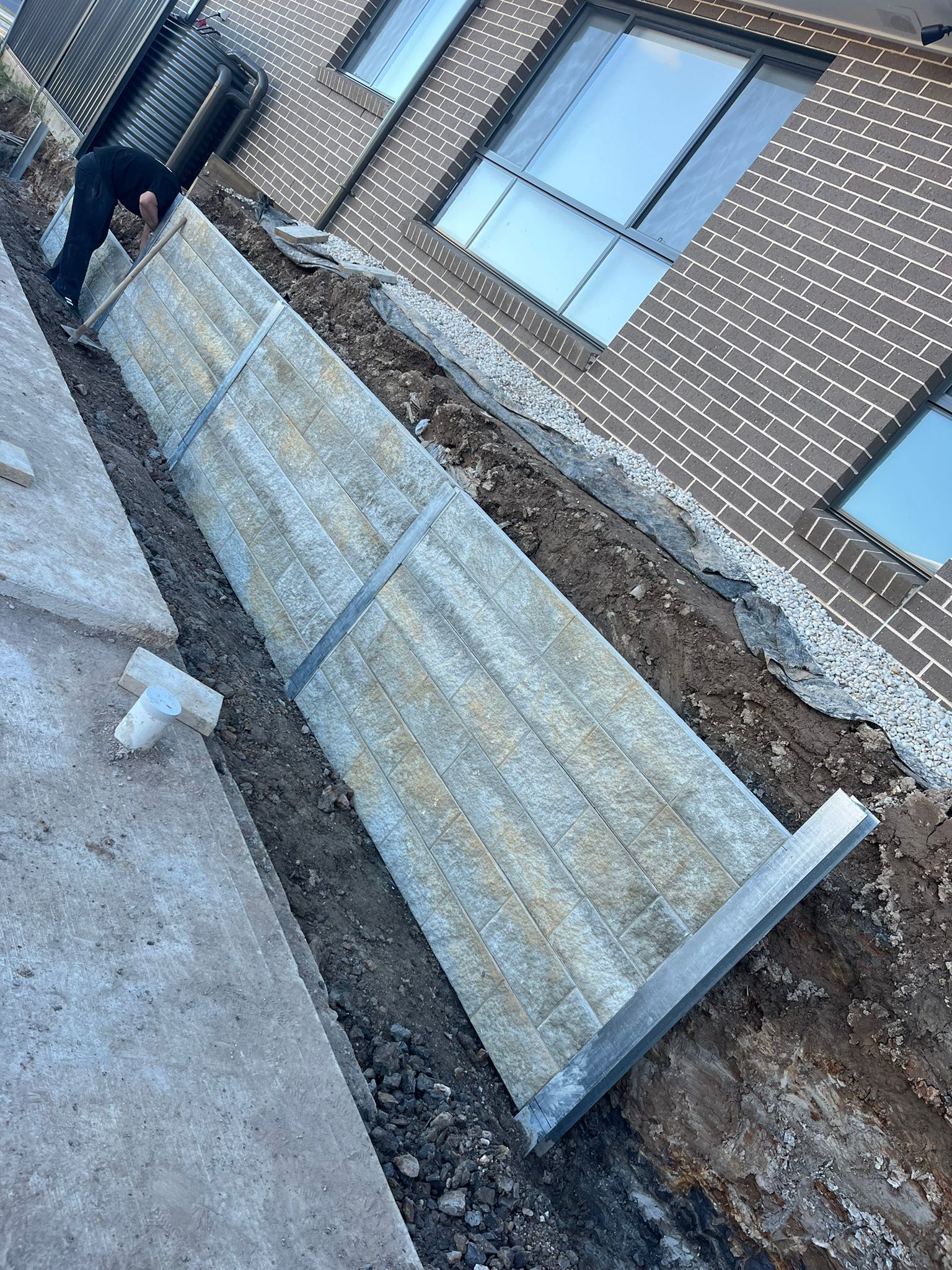 Timber sleeper retaining wall installation